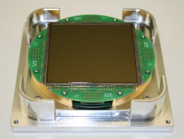 DESI imaging sensor produced by ITL attached to the baseplate of the storage container.